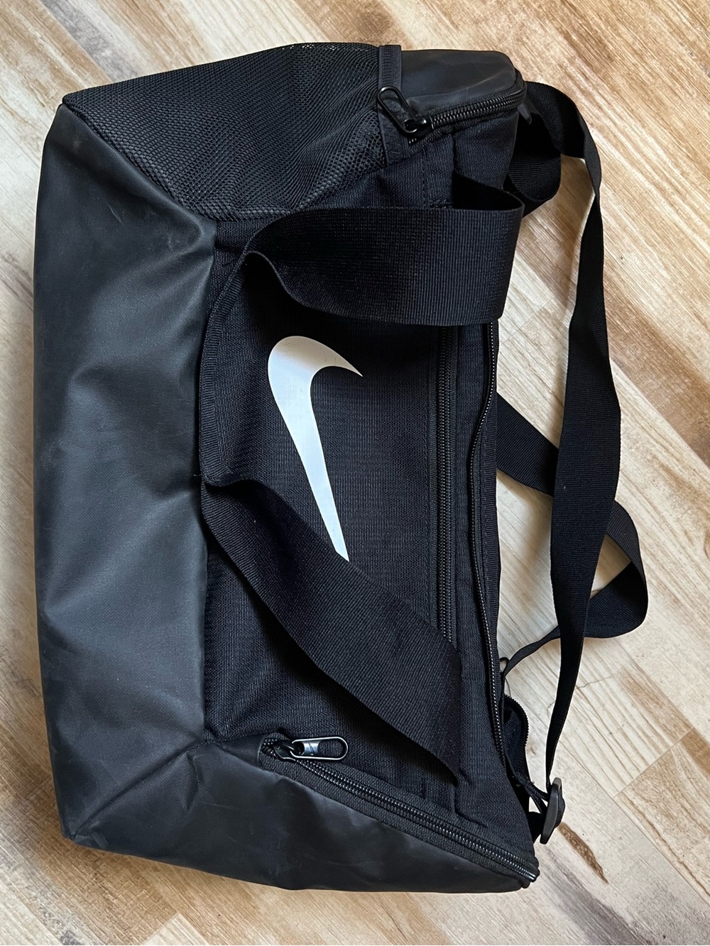 Nike Black Duffel Bag with White Swoosh Logo